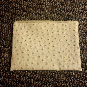 Small, beige color, real ostrich make up bag like new